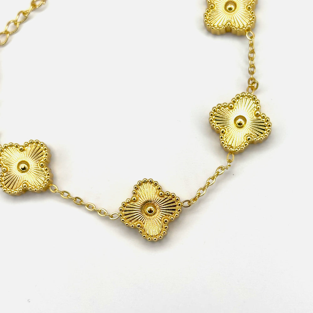 The Radiant Golden Clover Bracelet